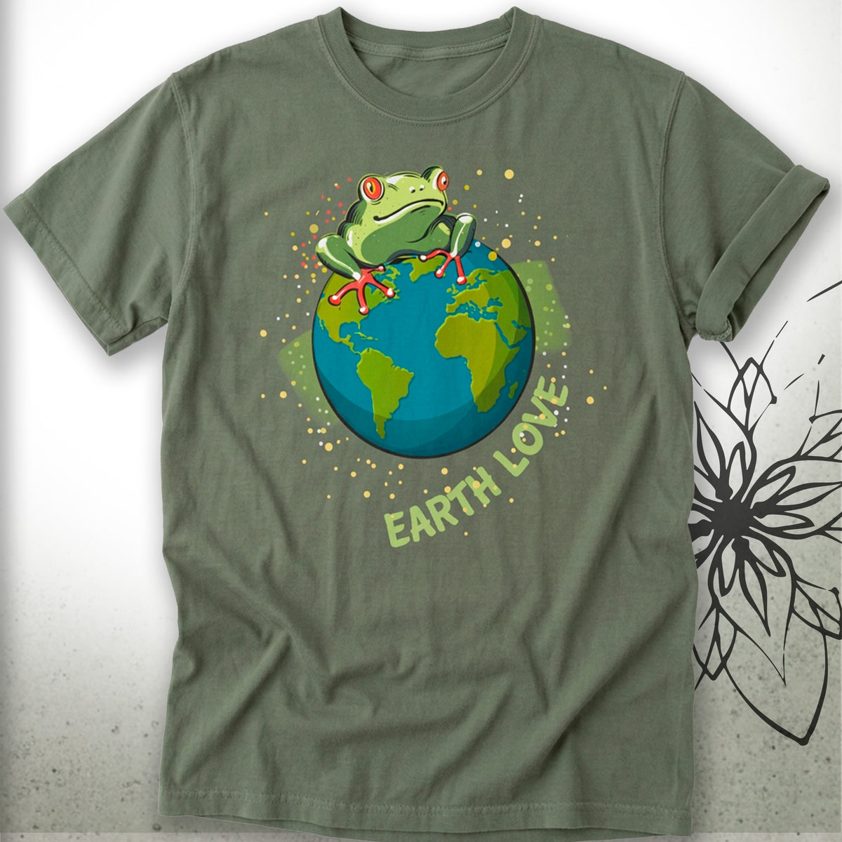 An olive green short-sleeve t-shirt featuring a graphic of a green tree frog sitting on a blue and green globe, with the text 'EARTH LOVE' printed below in a light green font.