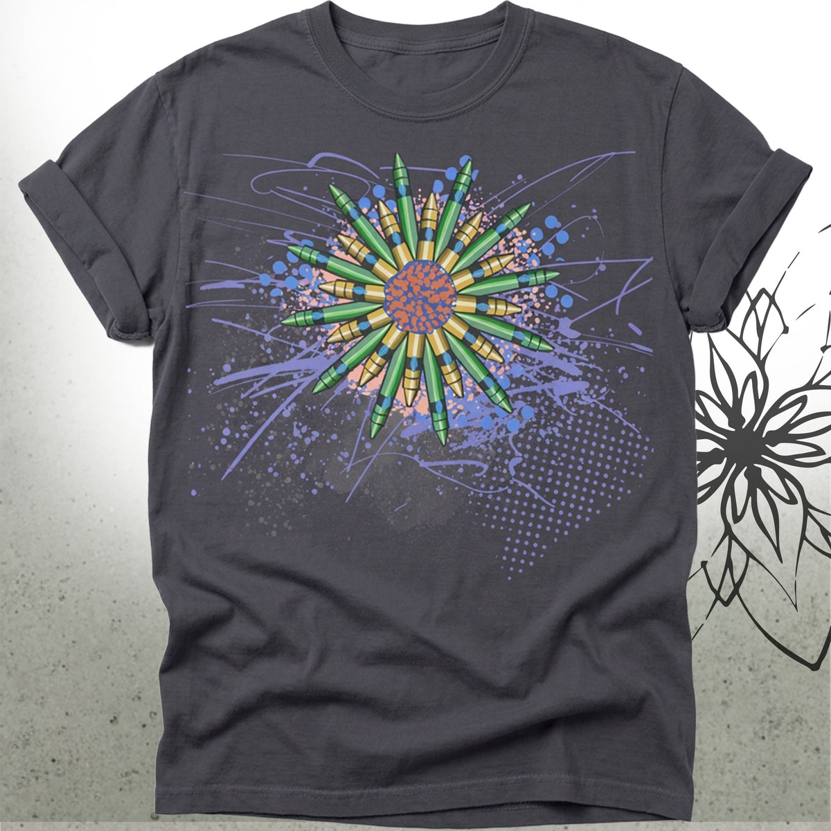 A dark charcoal gray t-shirt featuring a colorful graphic print of a stylized sunburst or mandala in green, yellow, orange, and blue, with purple paint splatter details.