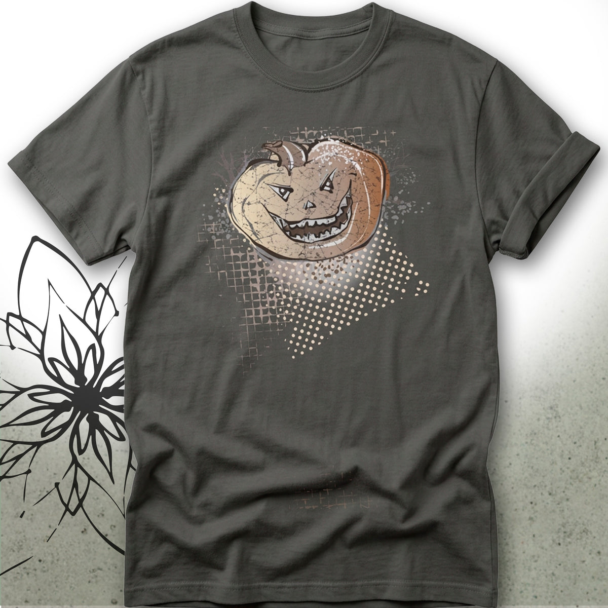 A dark charcoal gray t-shirt featuring a distressed graphic of a smiling jack-o'-lantern pumpkin with a pixelated digital background pattern.